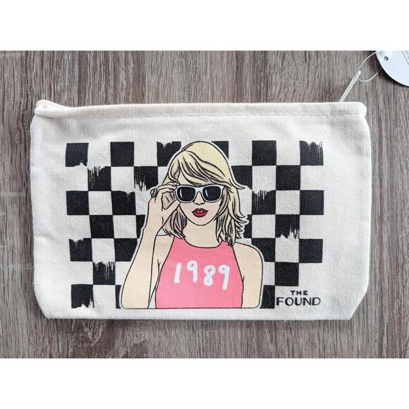 Taylor Swift Handbags - NWT Taylor Swift Make Up Bag 1989 Taylor Swift With Sunglasses By The Found